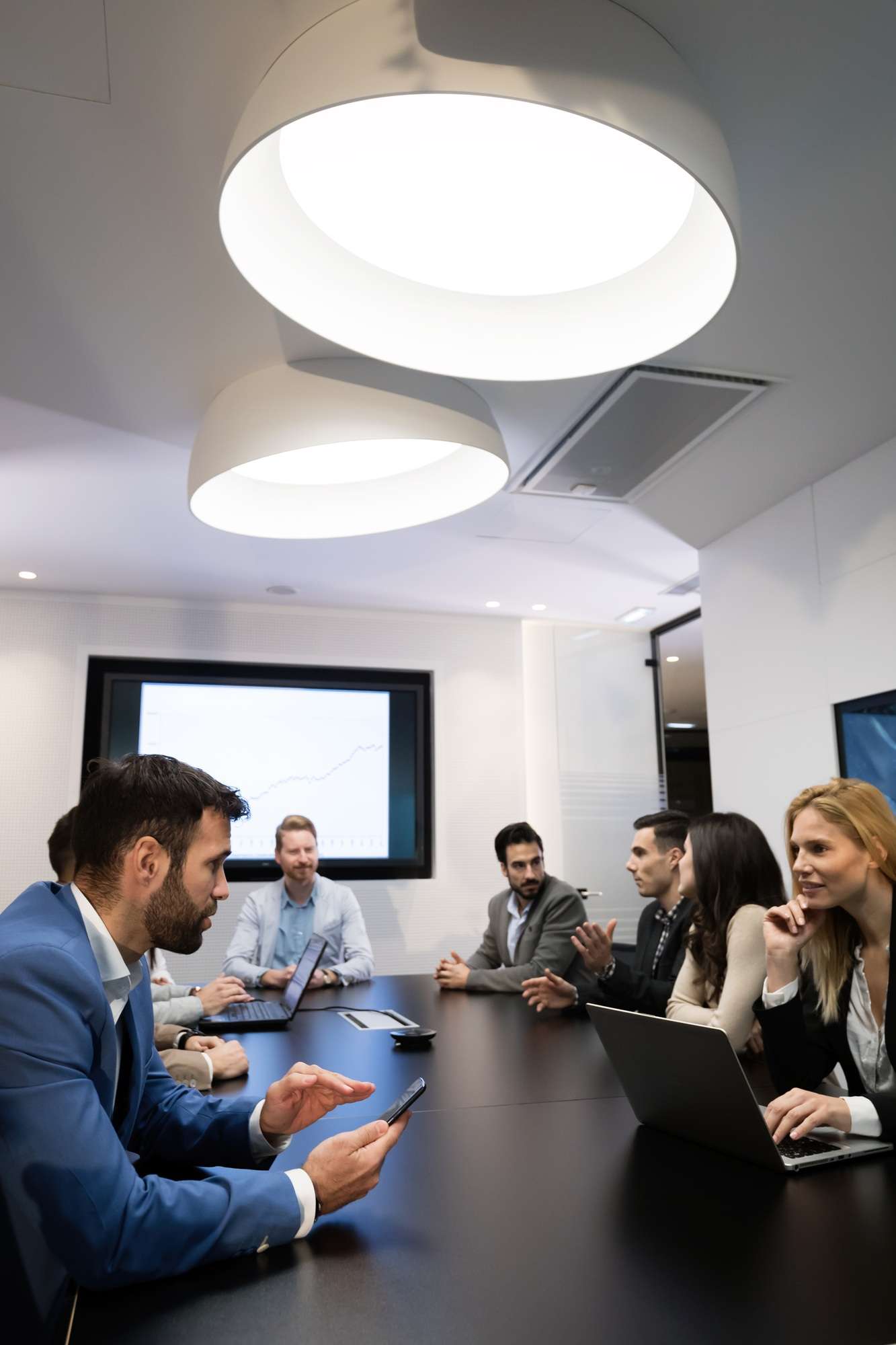 Business meeting in modern conference room